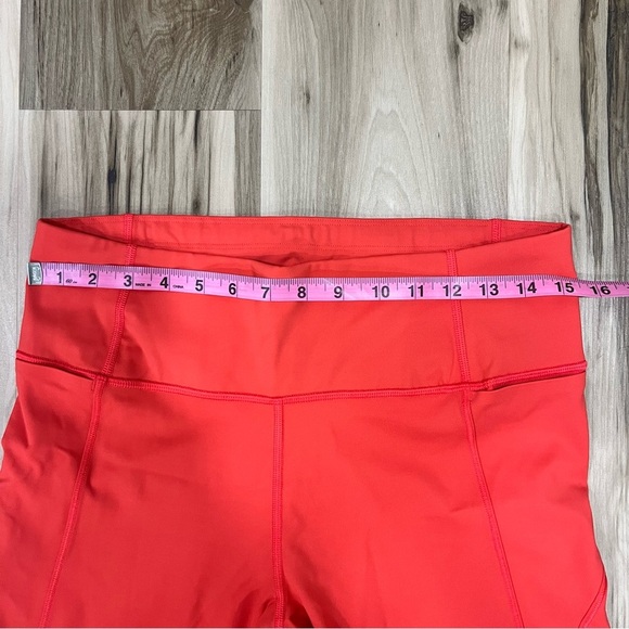 Athleta x Peloton Velocity 7/8 Orange Leggings with Zipper Pouch - Picture 9 of 11